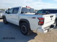 ✅ 2023 Nissan Frontier Pro-4X • VIN: 1N6ED1EKXPN662561 • Lot: 43432334. Listed on IAAI with 73,303 mi. Free auction sales archive from the USA and detailed vehicle history report at DreamBid. Image 3.