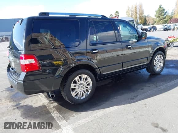 ✅ 2013 Ford Expedition Limited • VIN: 1FMJU2A57DEF14026 • Lot: 40861294. Listed on IAAI with 134,411 mi. Free auction sales archive from the USA and detailed vehicle history report at DreamBid. Image 4.