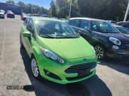 ✅ 2014 Ford Fiesta SE • VIN: 3FADP4EJ6EM117291 • Lot: 43755463. Wystawiony na IAAI z przebiegiem 95 374 mil. Bezpłatny archiwum sprzedaży aukcyjnych z USA i szczegółowy raport historii pojazdu na DreamBid. Zdjęcie 1.