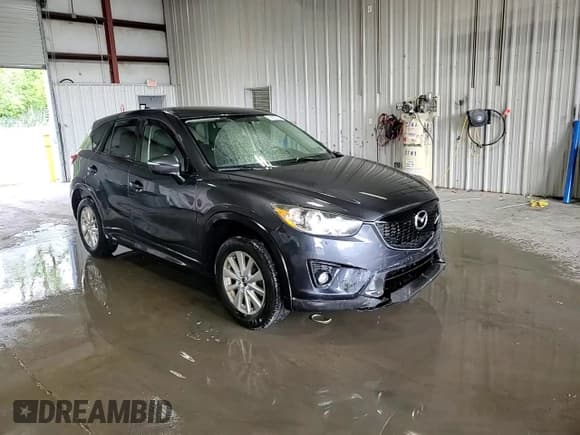 ✅ 2015 Mazda CX-5 Touring • VIN: JM3KE2CY6F0506259 • Lot: 69928775. Listed on Copart with 140,555 mi. Free auction sales archive from the USA and detailed vehicle history report at DreamBid. Image 15.