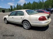 ✅ 2000 Lincoln Continental • VIN: 1LNHM97V9YY807381 • Лот: 60002835. Опубликован ранее на Copart с пробегом 96 519 миль. Бесплатный доступ к архиву аукционных продаж из США и подробный отчёт об истории автомобиля на DreamBid. Изображение 2.