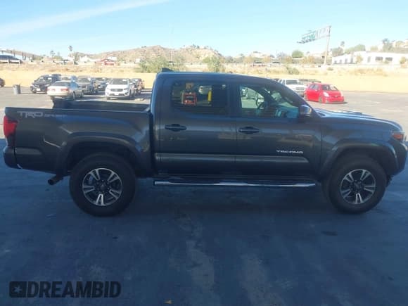 ✅ 2019 Toyota Tacoma TRD Sport • VIN: 3TMAZ5CN1KM081833 • Lot: 43656686. Listed on IAAI with 133,830 mi. Free auction sales archive from the USA and detailed vehicle history report at DreamBid. Image 14.