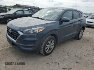 ✅ 2021 Hyundai Tucson SE • VIN: KM8J23A42MU313384 • Лот: 84413945. Опубликован ранее на Copart с пробегом 27 309 миль. Бесплатный доступ к архиву аукционных продаж из США и подробный отчёт об истории автомобиля на DreamBid. Изображение 1.