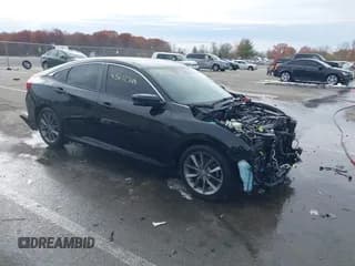 ✅ 2021 Honda Civic EX • VIN: 19XFC1F30ME000604 • Lot: 43612748. Listed on IAAI with 58,774 mi. Free auction sales archive from the USA and detailed vehicle history report at DreamBid. Image 1.