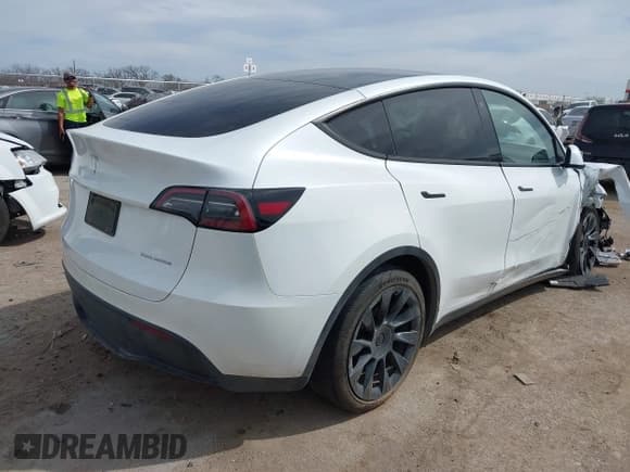✅ 2023 Tesla Model Y Long Range • VIN: 7SAYGDEE3PA072042 • Lot: 41795216. Listed on IAAI with 40,905 mi. Free auction sales archive from the USA and detailed vehicle history report at DreamBid. Image 4.