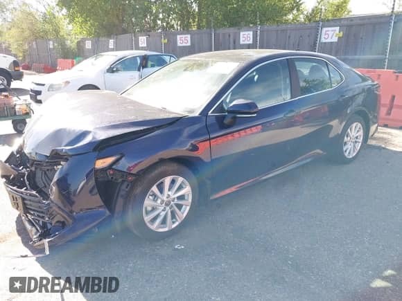 2021 Toyota Camry LE with VIN 4T1C11BK9MU035127, listed as a IAAI auction lot 43239092 with 21,677 mi miles and . Bid and sale history available at DreamBid. Image 18.