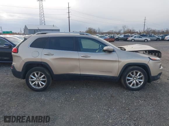 ✅ 2014 Jeep Cherokee Limited • VIN: 1C4PJMDSXEW300700 • Лот: 43648307. Опубликован ранее на IAAI с пробегом 125 257 миль. Бесплатный доступ к архиву аукционных продаж из США и подробный отчёт об истории автомобиля на DreamBid. Изображение 13.
