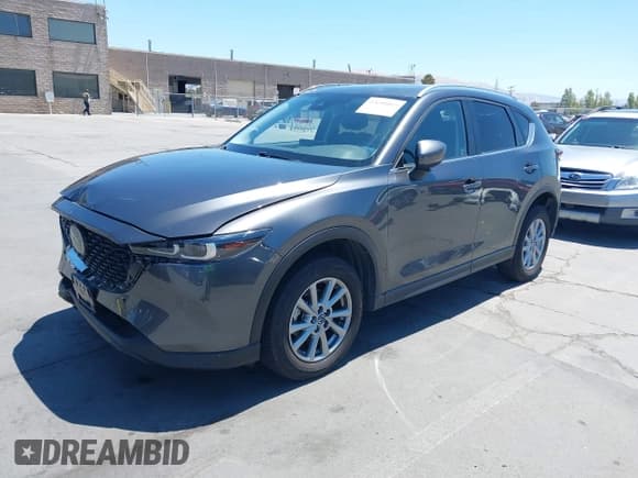 ✅ 2022 Mazda CX-5 S Carbon Edition • VIN: JM3KFBCM1N0610053 • Lot: 42698865. Listed on IAAI with 26,944 mi. Free auction sales archive from the USA and detailed vehicle history report at DreamBid. Image 17.