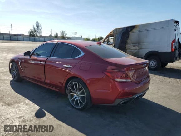 ✅ 2020 Genesis G70 3.3T • VIN: KMTG34LEXLU057731 • Lot: 48794325. Listed on Copart with 93,504 mi. Free auction sales archive from the USA and detailed vehicle history report at DreamBid. Image 2.