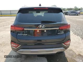 ✅ 2019 Hyundai Santa Fe Ultimate • VIN: 5NMS5CAA7KH084632 • Lot: 64693704. Wystawiony na Copart z przebiegiem 81 479 mil. Bezpłatny archiwum sprzedaży aukcyjnych z USA i szczegółowy raport historii pojazdu na DreamBid. Zdjęcie 6.