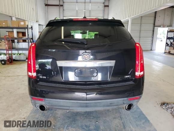 ✅ 2016 Cadillac SRX • VIN: 3GYFNAE38GS530976 • Lot: 61811775. Wystawiony na Copart z przebiegiem 220 745 mil. Bezpłatny archiwum sprzedaży aukcyjnych z USA i szczegółowy raport historii pojazdu na DreamBid. Zdjęcie 6.