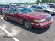 ✅ 1996 Lincoln Town Car Executive • VIN: 1LNLM81W9TY675060 • Lot: 42394018. Listed on IAAI with Not provided. Free auction sales archive from the USA and detailed vehicle history report at DreamBid. Image 1.
