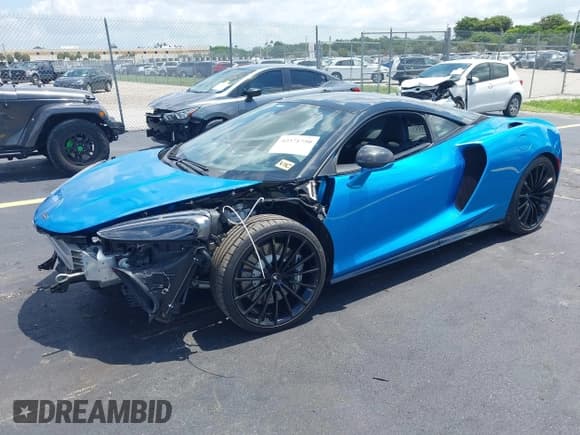 ✅ 2021 McLaren GT • VIN: SBM22GCA7MW000989 • Lot: 42371750. Wystawiony na IAAI z przebiegiem 3 096 mil. Bezpłatny archiwum sprzedaży aukcyjnych z USA i szczegółowy raport historii pojazdu na DreamBid. Zdjęcie 2.