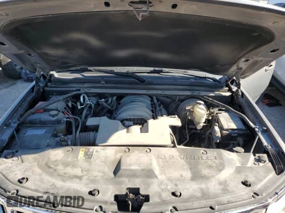 2018 Chevrolet Suburban LS z VIN 1GNSKGEC8JR390719, wystawiony jako Copart lot #77217534 z przebiegiem 83 356 mil mil oraz Szkoda całkowita • Salvage title. Historia ofert i sprzedaży dostępna na DreamBid. Obrazek 13.