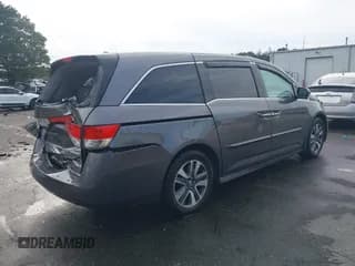 ✅ 2015 Honda Odyssey Touring Elite • VIN: 5FNRL5H9XFB041101 • Лот: 43063363. Опубликован ранее на IAAI с пробегом 162 011 миль. Бесплатный доступ к архиву аукционных продаж из США и подробный отчёт об истории автомобиля на DreamBid. Изображение 4.