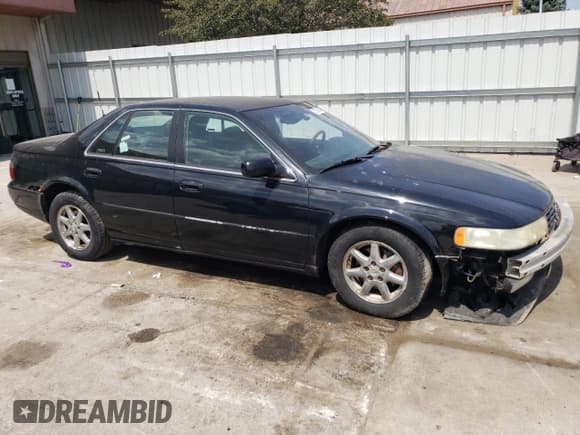 ✅ 2001 Cadillac Seville Touring STS • VIN: 1G6KY54961U257426 • Лот: 45269275. Опубликован ранее на Copart с пробегом 177 990 миль. Бесплатный доступ к архиву аукционных продаж из США и подробный отчёт об истории автомобиля на DreamBid. Изображение 4.