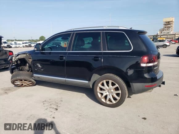 ✅ 2009 Volkswagen Touareg VR6 • VIN: WVGBE77L89D016693 • Lot: 61815265. Listed on Copart with 124,172 mi. Free auction sales archive from the USA and detailed vehicle history report at DreamBid. Image 2.
