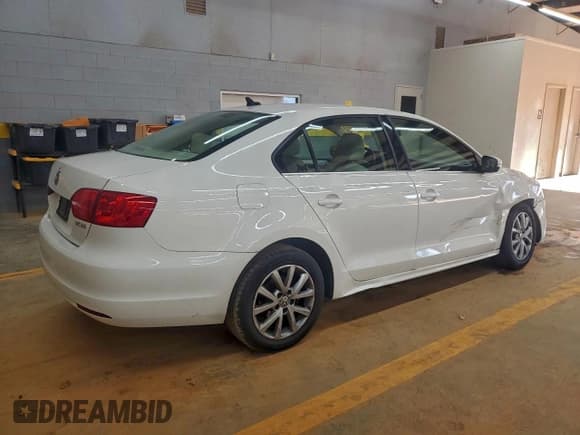 ✅ 2013 Volkswagen Jetta SE • VIN: 3VWDP7AJ5DM438624 • Lot: 94568665. Listed on Copart with 163,247 mi. Free auction sales archive from the USA and detailed vehicle history report at DreamBid. Image 3.