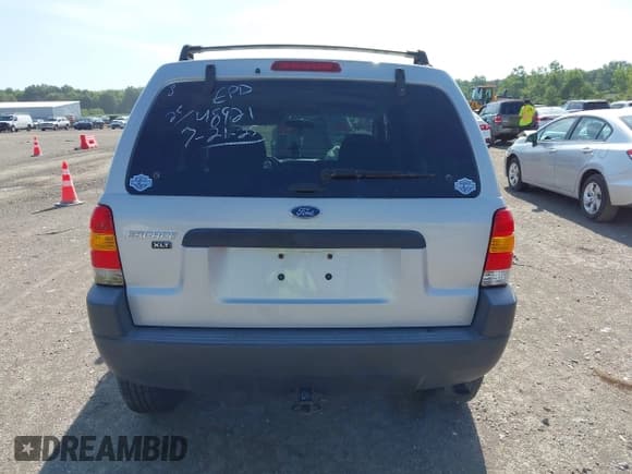 ✅ 2004 Ford Escape XLT • VIN: 1FMYU931X4KB19082 • Lot: 42844876. Listed on IAAI with 86,428 mi. Free auction sales archive from the USA and detailed vehicle history report at DreamBid. Image 16.