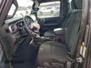 ✅ 2018 Jeep Wrangler Unlimited Sahara • VIN: 1C4HJXEG0JW322926 • Lot: 94485715. Listed on Copart with 76,414 mi. Free auction sales archive from the USA and detailed vehicle history report at DreamBid. Image 7.