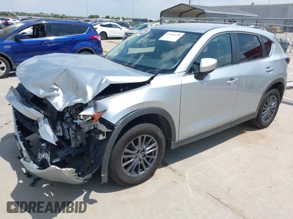 ✅ 2020 Mazda CX-5 Touring • VIN: JM3KFBCM9L0787379 • Lot: 42948238. Wystawiony na IAAI z przebiegiem 190 399 mil. Bezpłatny archiwum sprzedaży aukcyjnych z USA i szczegółowy raport historii pojazdu na DreamBid. Zdjęcie 22.