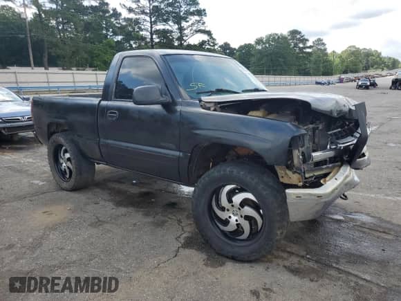 2002 Chevrolet Silverado 1500 LS with VIN 1GCEK14T72Z106860, listed as a Copart auction lot 54909765 with 301,431 mi miles and Salvage title. Bid and sale history available at DreamBid. Image 4.