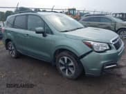 ✅ 2018 Subaru Forester Premium • VIN: JF2SJAEC4JH404549 • Lot: 42916191. Listed on IAAI with 81,904 mi. Free auction sales archive from the USA and detailed vehicle history report at DreamBid. Image 1.