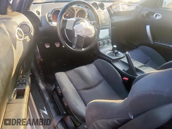 ✅ 2005 Nissan 350Z • VIN: JN1AZ34D05M605342 • Лот: 69046905. Опубликован ранее на Copart с пробегом 84 516 миль. Бесплатный доступ к архиву аукционных продаж из США и подробный отчёт об истории автомобиля на DreamBid. Изображение 8.