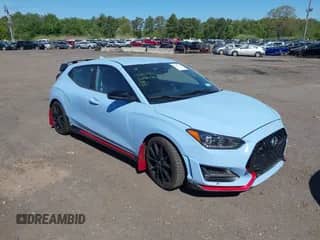 2020 Hyundai Veloster z VIN KMHT36AH8LU003913, wystawiony jako IAAI lot #42217722 z przebiegiem 33 996 mil mil oraz . Historia ofert i sprzedaży dostępna na DreamBid. Obrazek 1.