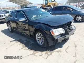 ✅ 2012 Chrysler 300 C • VIN: 2C3CCAET6CH288785 • Lot: 41987013. Listed on IAAI with 158,989 mi. Free auction sales archive from the USA and detailed vehicle history report at DreamBid. Image 1.