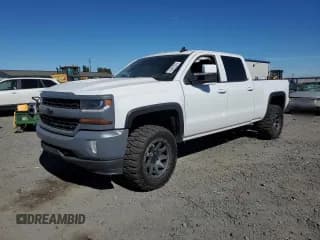 ✅ 2016 Chevrolet Silverado 1500 LT • VIN: 3GCUKREC9GG258445 • Лот: 72461724. Опубликован ранее на Copart с пробегом 242 947 миль. Бесплатный доступ к архиву аукционных продаж из США и подробный отчёт об истории автомобиля на DreamBid. Изображение 1.