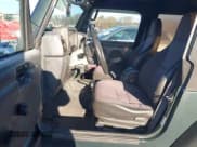 ✅ 2002 Jeep Wrangler Sport • VIN: 1J4FA49S52P755359 • Лот: 43712663. Опубликован ранее на IAAI с пробегом 144 014 миль. Бесплатный доступ к архиву аукционных продаж из США и подробный отчёт об истории автомобиля на DreamBid. Изображение 5.