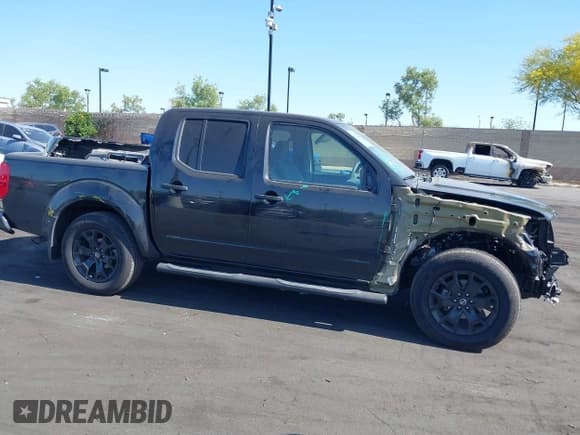 ✅ 2021 Nissan Frontier SV • VIN: 1N6ED0EA7MN702186 • Lot: 42286772. Listed on IAAI with 70,393 mi. Free auction sales archive from the USA and detailed vehicle history report at DreamBid. Image 14.