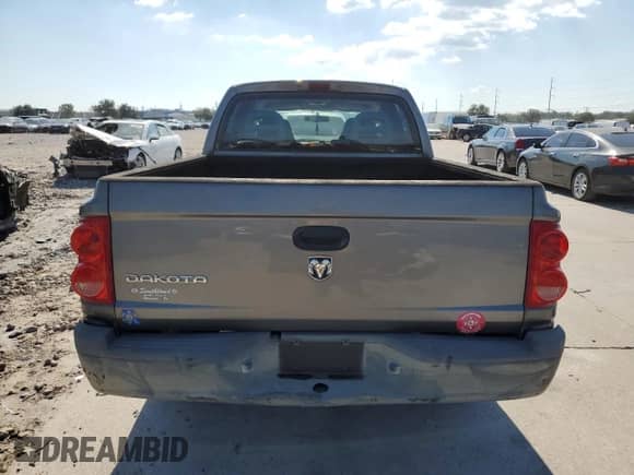 2006 Dodge Dakota ST z VIN 1D7HE28K36S522601, wystawiony jako Copart lot #73888054 z przebiegiem 149 142 mil mil oraz Szkoda całkowita • Salvage title. Historia ofert i sprzedaży dostępna na DreamBid. Obrazek 6.