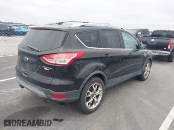 ✅ 2013 Ford Escape Titanium • VIN: 1FMCU9J95DUD66288 • Lot: 43886070. Listed on IAAI with 201,362 mi. Free auction sales archive from the USA and detailed vehicle history report at DreamBid. Image 4.