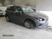 ✅ 2016 Mazda CX-5 Touring • VIN: JM3KE4CYXG0713069 • Lot: 82329005. Wystawiony na Copart z przebiegiem 135 308 mil. Bezpłatny archiwum sprzedaży aukcyjnych z USA i szczegółowy raport historii pojazdu na DreamBid. Zdjęcie 4.