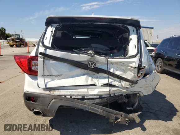 ✅ 2021 Honda Passport EX-L • VIN: 5FNYF7H52MB008411 • Lot: 70598655. Listed on Copart with 94,422 mi. Free auction sales archive from the USA and detailed vehicle history report at DreamBid. Image 6.