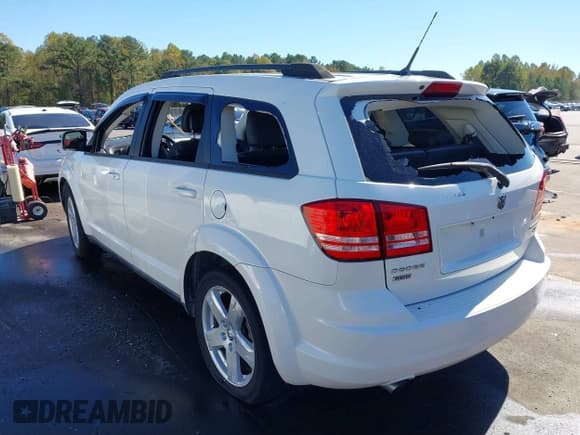 ✅ 2010 Dodge Journey SXT • VIN: 3D4PH5FV4AT253644 • Lot: 43444453. Listed on IAAI with 163,756 mi. Free auction sales archive from the USA and detailed vehicle history report at DreamBid. Image 3.