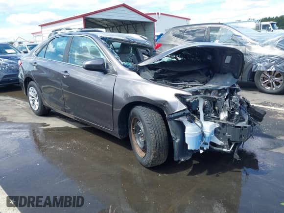2015 Toyota Camry LE with VIN 4T4BF1FK4FR446399, listed as a IAAI auction lot 43128423 with 82,545 mi miles and . Bid and sale history available at DreamBid. Image 1.