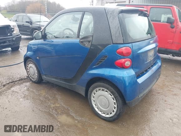 ✅ 2009 Smart fortwo Pure • VIN: WMEEJ31X69K312553 • Lot: 41957660. Listed on IAAI with 156,476 mi. Free auction sales archive from the USA and detailed vehicle history report at DreamBid. Image 3.