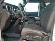 ✅ 2023 Jeep Wrangler Willys Sport • VIN: 1C4HJXDN4PW545253 • Lot: 70125505. Listed on Copart with 37,323 mi. Free auction sales archive from the USA and detailed vehicle history report at DreamBid. Image 7.