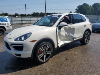 ✅ 2012 Porsche Cayenne Turbo • VIN: WP1AC2A25CLA80341 • Lot: 69180005. Listed on Copart with 68,961 mi. Free auction sales archive from the USA and detailed vehicle history report at DreamBid. Image 1.