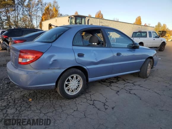 ✅ 2004 Kia Rio • VIN: KNADC125946336107 • Лот: 79957854. Опубликован ранее на Copart с пробегом 201 254 миль. Бесплатный доступ к архиву аукционных продаж из США и подробный отчёт об истории автомобиля на DreamBid. Изображение 3.
