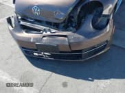 ✅ 2014 Volkswagen Beetle 2.0L TDI w/Sun/Sound/Nav • VIN: 3VWJL7AT1EM617082 • Лот: 43442124. Опубликован ранее на IAAI с пробегом 110 037 миль. Бесплатный доступ к архиву аукционных продаж из США и подробный отчёт об истории автомобиля на DreamBid. Изображение 12.