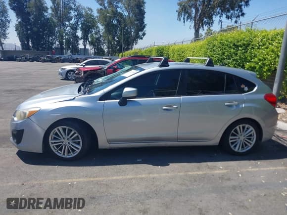 ✅ 2012 Subaru Impreza Premium • VIN: JF1GPAE66CH229646 • Lot: 42837558. Listed on IAAI with 118,893 mi. Free auction sales archive from the USA and detailed vehicle history report at DreamBid. Image 14.