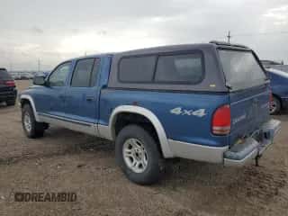 2004 Dodge Dakota SLT z VIN 1D7HG48N04S695750, wystawiony jako Copart lot #61059154 z przebiegiem Nie podano mil oraz Szkoda całkowita • Salvage title. Historia ofert i sprzedaży dostępna na DreamBid. Obrazek 2.