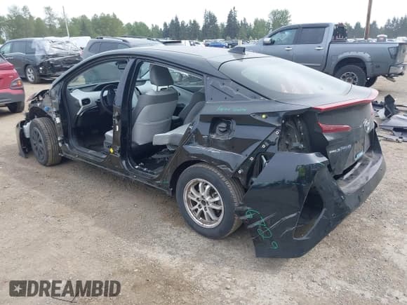 ✅ 2021 Toyota Prius LE • VIN: JTDKAMFP0M3179016 • Lot: 42204095. Listed on IAAI with 34,691 mi. Free auction sales archive from the USA and detailed vehicle history report at DreamBid. Image 3.