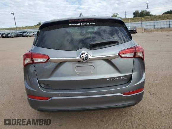✅ 2020 Buick Envision Essence • VIN: LRBFX2SA2LD017482 • Lot: 85260285. Listed on Copart with 77,796 mi. Free auction sales archive from the USA and detailed vehicle history report at DreamBid. Image 6.