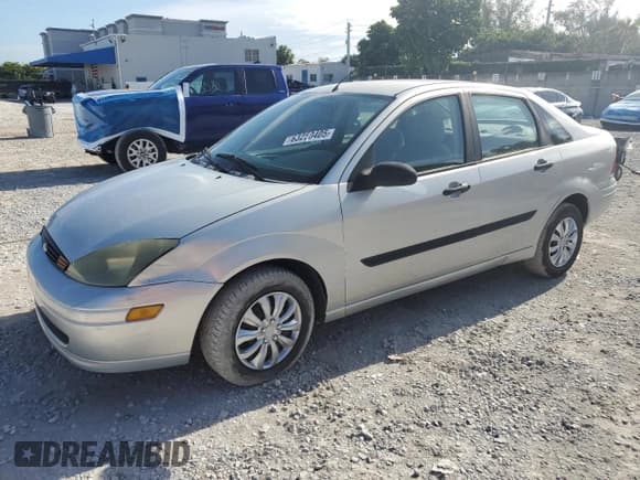 ✅ 2003 Ford Focus LX • VIN: 1FAFP33P93W312311 • Lot: 63250405. Listed on Copart with 80,148 mi. Free auction sales archive from the USA and detailed vehicle history report at DreamBid. Image 1.