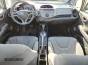 ✅ 2009 Honda Fit • VIN: JHMGE88219C006579 • Lot: 91298605. Listed on Copart with 150,024 mi. Free auction sales archive from the USA and detailed vehicle history report at DreamBid. Image 8.